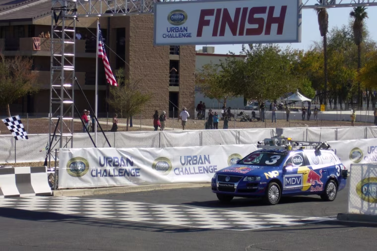 Junior, a 2006 Volkswagen Passat, heavily modified and robotized by a team of Stanford University, crosses the finish line in first place of the DARPA Grand Challenge on Nov. 3, 2007, in Victorville, Calif.